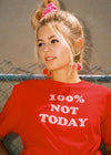 Top Knot Goods red cotton shirt with white writing that reads 100 percent Not Today