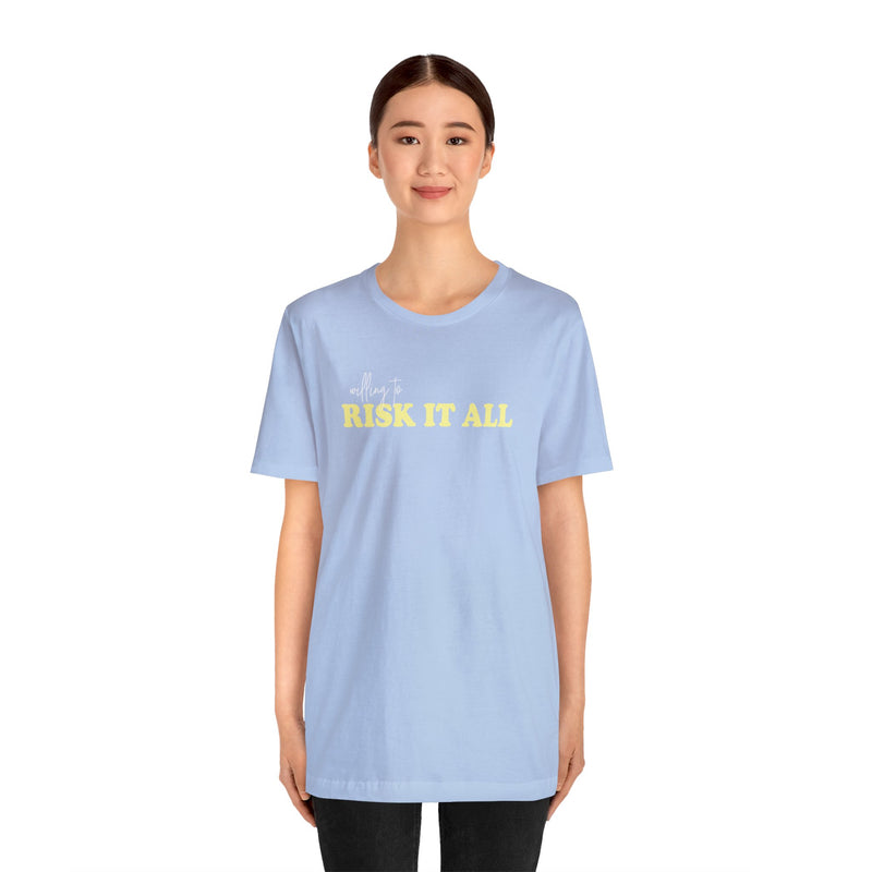 Model wearing Blue Shirt that says willing to Risk it All.