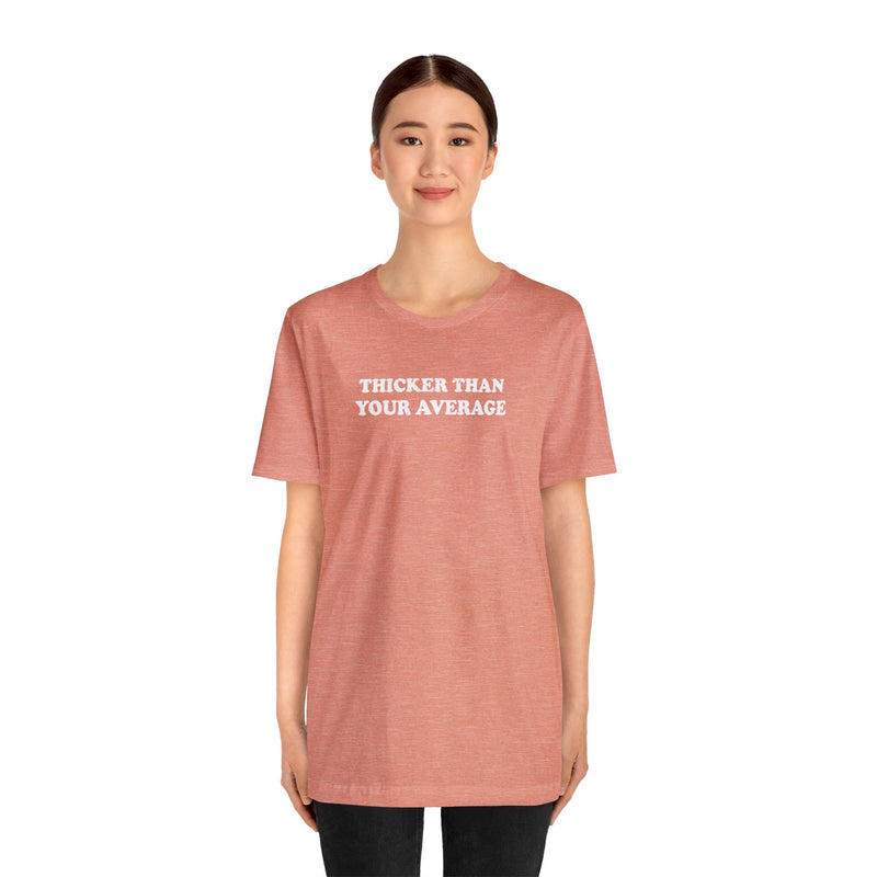 Female Model wearing Thicker Than Your Average distressed T-Shirt. 