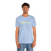 Male Model wearing Blue T-Shirt that Says Willing To Risk It All. 