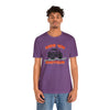 Male model wearing purple colored T-Shirt with a monster Truck on it that says Ride Em Shotgun.