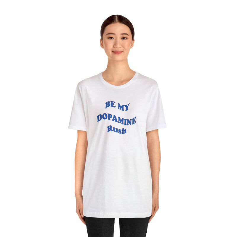 Female model wearing white cotton t-shirt that says Be My Dopamine Rush in wavy writing