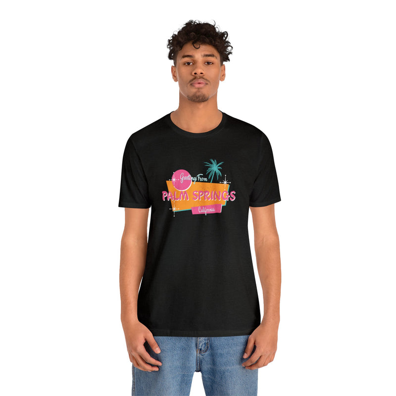 male Model wearing black Greetings from Palm Spings California T-Shirt.