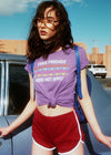 Purple cotton T-shirt by Top Knot Goods that says Fake Friends Need Not Apply