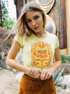 Girl wearing yellow Moon Swoon tee from Top Knot Goods