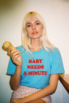 Vintage baby blue womans t-shirt with red text 